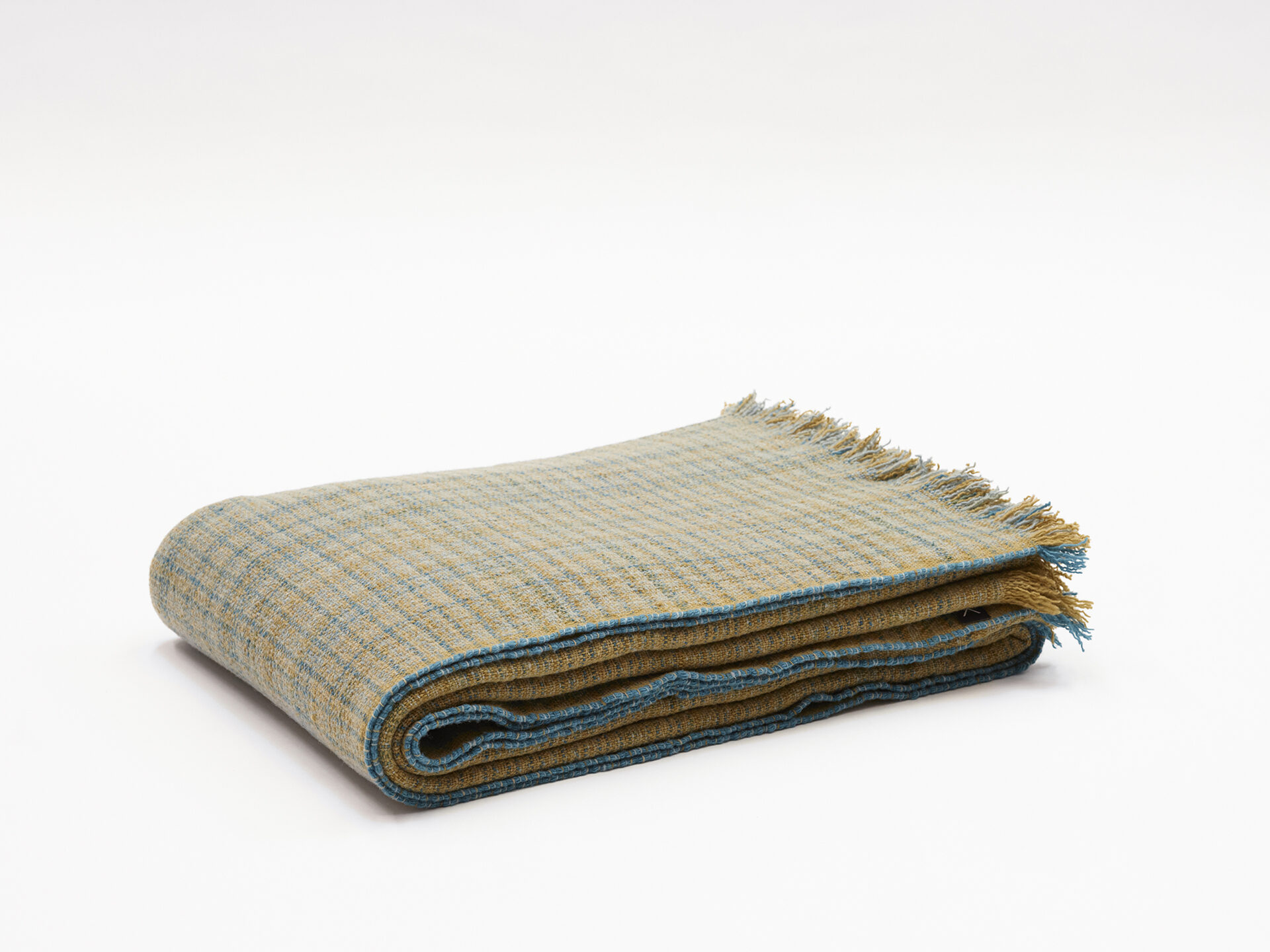 Wool merino blanket in olive green