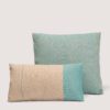 Emuna a cushion cover in 100% certified European linen, a timeless classic blending natural colors and vibrant tones inspired by the Mediterranean. Una funda de cojín artesanal de lino europeo certificado en tonos turquesas inspirado en el mediterraneo