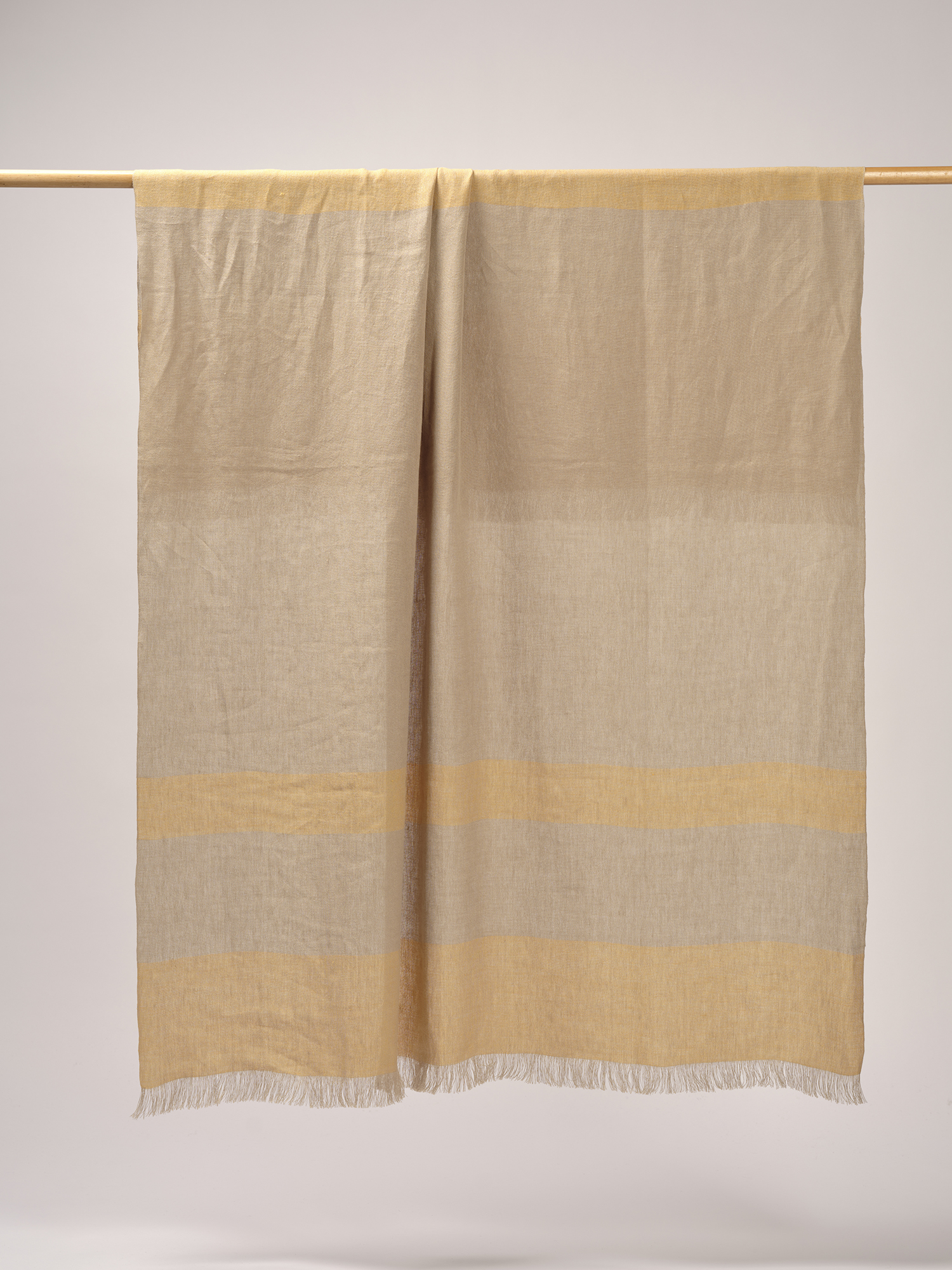 european linen throw in yellow and sandy color