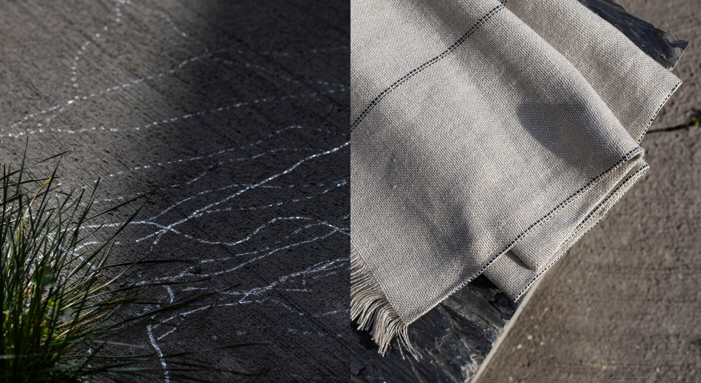 Abans home linen throws over a stone surface